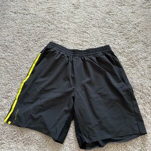 IVY PARK Black and Yellow Athletic Shorts with Elastic Waistband